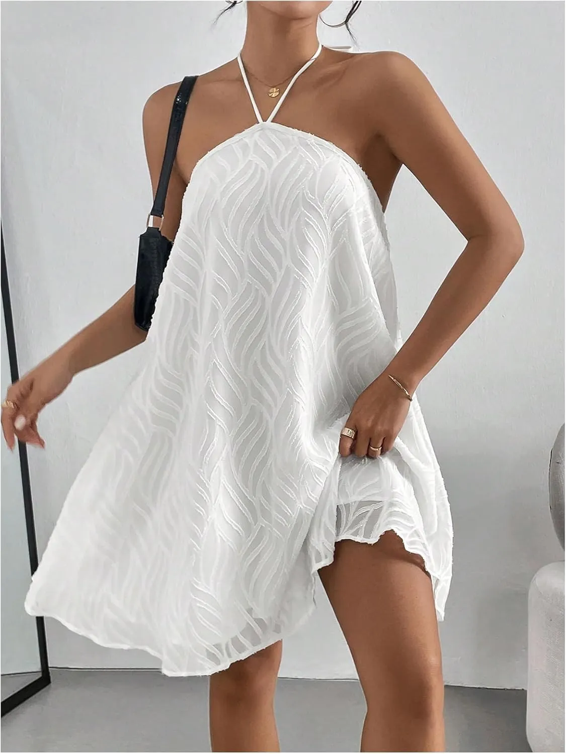 OYOANGLE Women's Textured Halter Backless Short Dress Sleeveless Flowy Vacation Mini Dresses